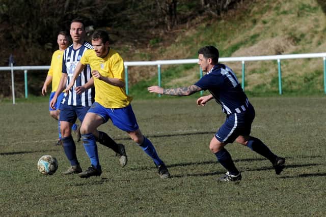 Joe Crompton makes a move for Farsley Celtic Juniors during their 3-0 West Riding County FA Challenge Cup semi-final defeat at Wortley. Picture: Steve Riding.