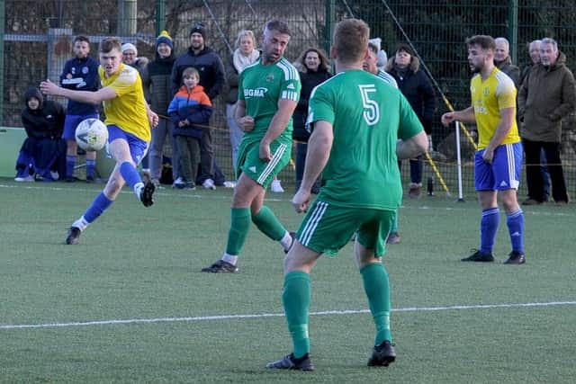 Horsforth St Margarets goalscorer Archie McDonnell shoots in the 2-0 West Yorkshire Premier win over Beeston St Anthony. Picture: Steve Riding.