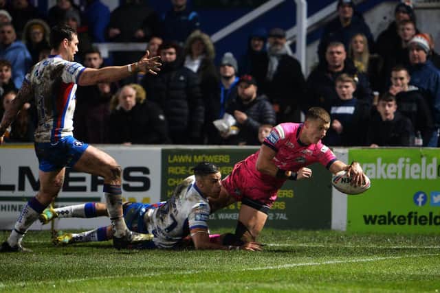 Ash Handley scores his third try for Rhinos against Wakefield. Picture by Jonathan Gawthorpe.