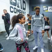 Olympic champion Nicola Adams at Bad Company Boxing Gym, Leeds, pictured with youngsters (left to right) Mya France, eight and Mylee Greener, nine 9, of Leeds.