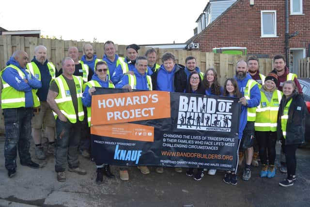 Band of Builders members who helped transform the home of father-of-two Howard Holden while he was recovering in a brain injury unit in Leeds (Photo: Band of Builders)