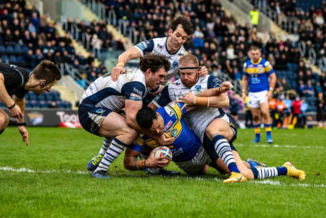 Rhinos will need a big performance from Zane Tetevano, seen scoring against Warrington in round one. Picture by Tony Johnson.