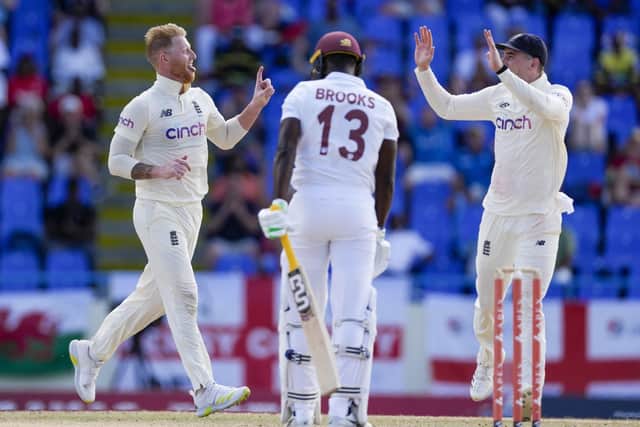 England's Ben Stokes celebrates the dismissal of West Indies' Shamarh Brooks during day two of the first Test at the Sir Vivian Richards Cricket Ground in North Sound, Antigua and Barbuda. Picture: AP Photo/Ricardo Mazalan.