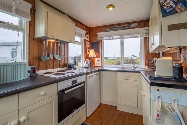 The boat has a fully equipped kitchen including an oven, kettle and toaster.
