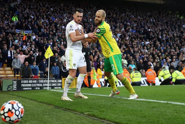 Teemu Pukki pushes Jack Harrison during Leeds United's 2-1 victory over Norwich City at Carrow Road. Pic: Julian Finney.