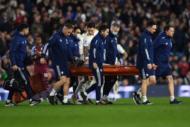 COSTLY BLOW - Leeds United lost their only senior left-back Junior Firpo to a knee injury against Aston Villa, ahead of a trip to Norwich City. Pic: Jonathan Gawthorpe