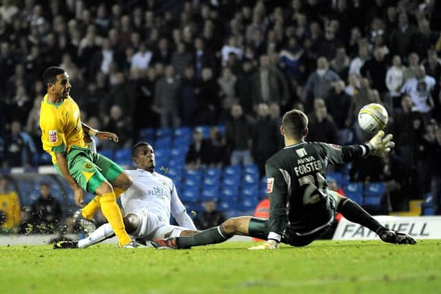 THE LAST LAUGH: Jermaine Beckford, centre, who had earlier been denied by a fine save from Fraser Forster, right, finally beats the Norwich City 'keeper to net a dramatic winner that sent Leeds United top of League One back in October 2009. Picture by Simon Hulme.