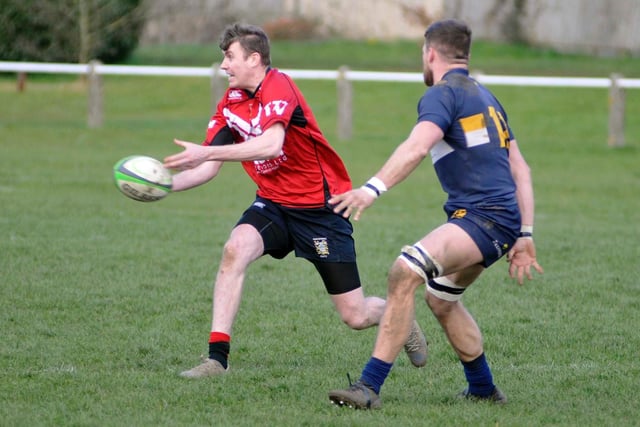 Fly-half Liam Kay looks for support.