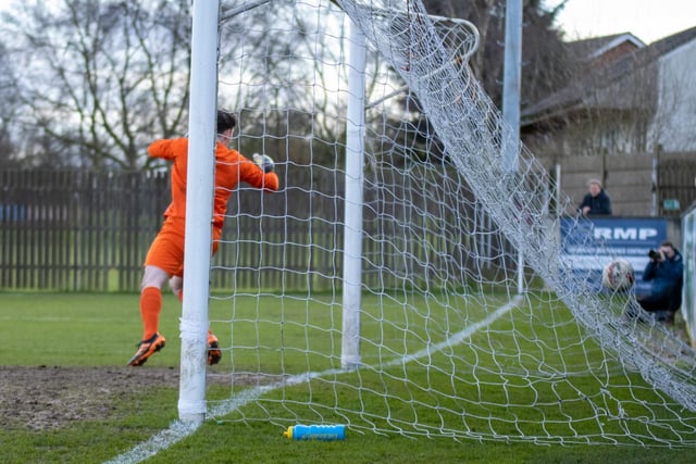The ball nestles in the net as Emley AFC score their winner. Picture: Mark Parsons