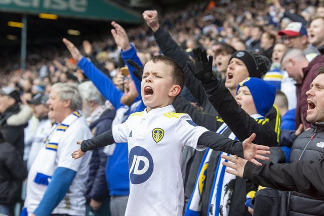 A young Leeds fan singing with heart.