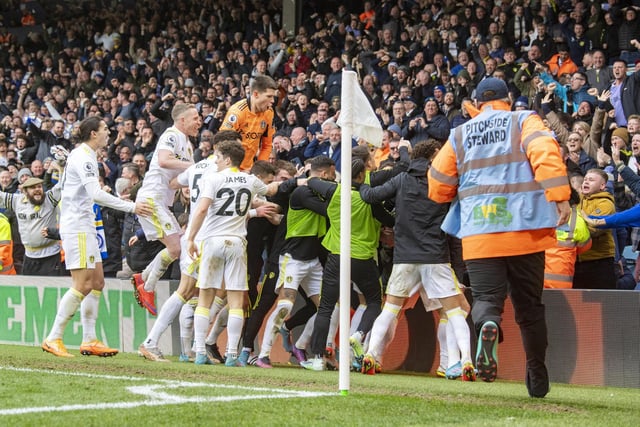 The Leeds United players celebrate Joe Gelhardt's last-minute winner with the fans.