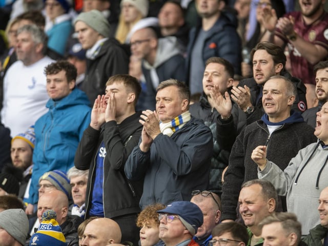 The home crowd get behind the players.