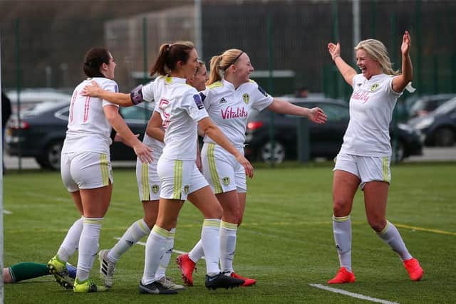 Laura Bartup (right) celebrates scoring with her Leeds United team-mates. Pic: LUFC.