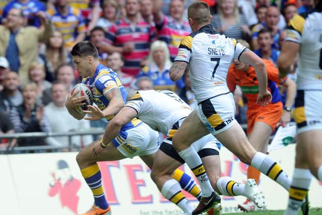 Tom Briscoe scores for Rhinos in their 2014 Wembley win over Castleford. Picture by Steve Riding.