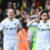 Rodrigo and Luke Ayling celebrate Leeds United's opening goal against Norwich City. Pic: Michael Regan.