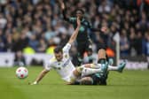 NIGGLY BATTLE: Between Leeds United winger Jack Harrison, left, and Norwich City full-back Max Aarons, right, in Sunday's barnstorming clash between the Whites and Canaries at Elland Road. Picture by Tony Johnson.