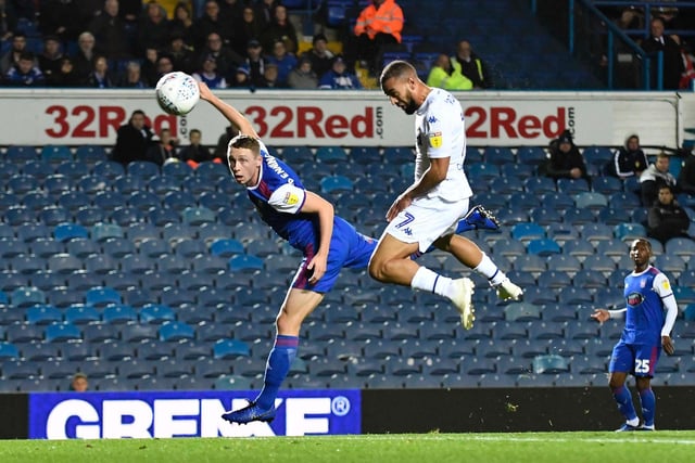 Kemar Roofe beats Ipswich Town's Matthew Pennington to the ball to head in the opening goal during the Championship clash at Elland Road in October 2018.
