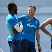 YOU'RE IN: England captain Joe Root chats with Jofra Archer and Saqib Mahmood, right, during a nets session. Picture: Gareth Copley/Getty Images