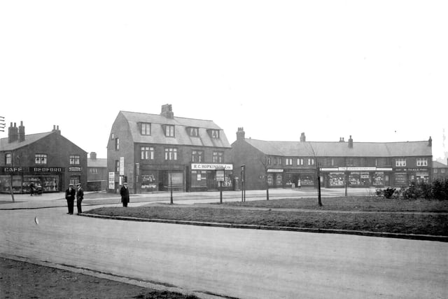 A parade of shops on left hand side of Middleton Park Circus pictured in November 1933. They were built between 1927 and 1929. Shops on the circus are, from left, John Gibb, butchers; R.C. Hopkinson Ltd., grocers; Mrs Maud Watson, drapers; Tom Marshall Gatenby, Middleton fruit market; Mrs Ethel Kershaw, chemist; William Teale, gentleman's outfitters. On the left is W.H. Dickinson, hairdressers and Ethel Bedford, cafe and confectioners.