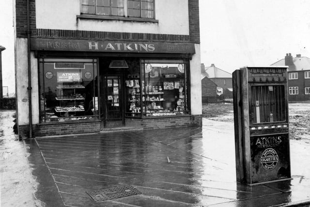 Shop business of Harry Atkins on Middleton Park Road in February 1937. A cigarette vending machine is on the pavement.