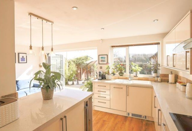 Downstairs, the current owners have modernised the kitchen and transformed it into a warm and inviting living space.