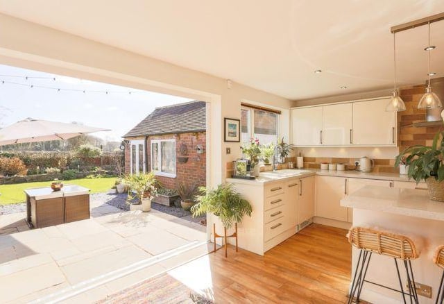 The owners have really brought the 'outside in' with the use of bi-folding doors that open out onto the raised patio. This is ideal for summer months.