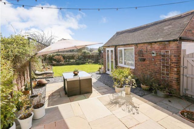 The garden is beautifully laid out and looks across open countryside. It has a raised patio area directly accessed from the bi-folding doors as well as a lawned area.