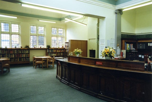 Inside Chapel Allerton Library on Harrogate Road, showing the counter area to the right. Though some of the library's furniture has been modernised and carpets laid on the floor, the counter area still has a traditional look to it, in keeping with its origins which go back to 1904.
