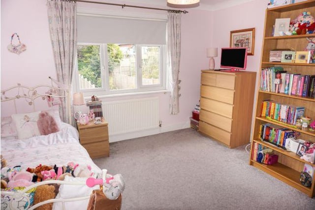 On the first floor are two double bedrooms and a single bedroom, currently used as a study.