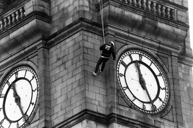This is Simon Young who abseiled down Leeds Town Hall's clock tower in November 1993 to raise public awareness of local youth activity.