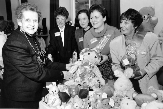 Lady Ryder who has helped thousands of people all over the world, dropped into Leeds as part of her 'Light of Hope' national tour visiting Sue Ryder charity shops in November 1993. She is  pictured with helpers after opening the 'Light of Hope' Week Fayre at Otley Civic Centre.