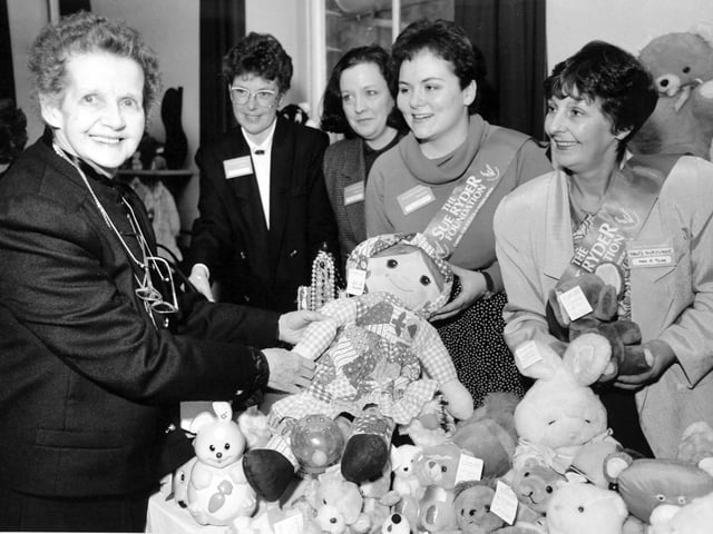 Lady Ryder who has helped thousands of people all over the world, dropped into Leeds as part of her 'Light of Hope' national tour visiting Sue Ryder charity shops in November 1993. She is pictured with helpers after opening the 'Light of Hope' Week Fayre at Otley Civic Centre.