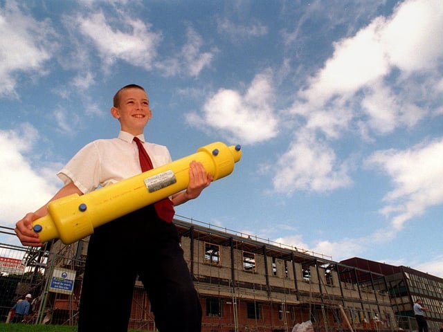 July 1997 and Farnley Park High was burying a time capsule to mark the completion of a new school building. Pictutred with the capsule in front of the new block is David Thompson.