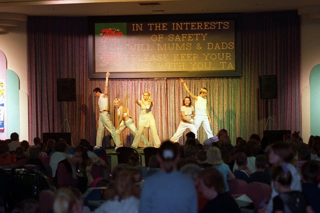 New Farnley's Riva Bingo Club hosted a fundraising concert in December 1999 in aid of the Yorkshire Evening Post Healthy Bones 2000 Scanner Appeal. Pictured on stage are  Step by Step who entertained with a special 45 minute performance.