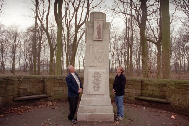 Local resident and organiser Carl Wise (right) and Coun Malcolm Bedford admire a new plaque on Farnley's war memorial in December 1999.