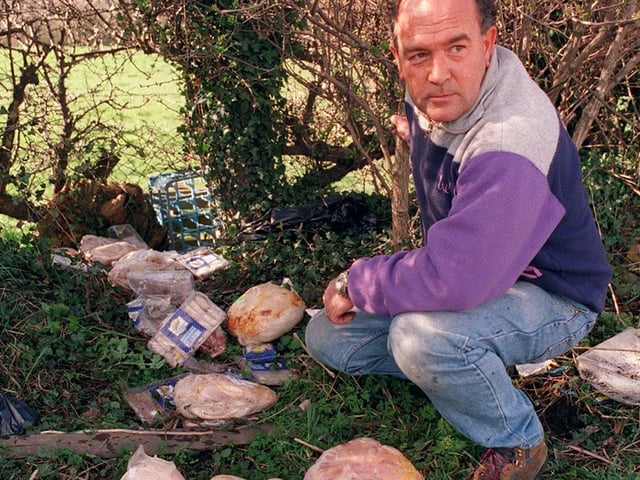 This is Nick Goodwin pictured with rotting meat dumped next to his stables in New Farnley in March 1999 which council chiefs will not remove.