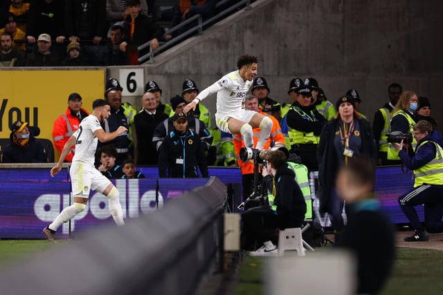 Rodrigo rushes to celebrate scoring Leeds United's second goal with the travelling fans.