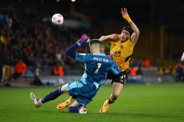 Illan Meslier and Raúl Jiménez collide during Leeds United's 3-2 win over Wolves. Pic: Marc Atkins.