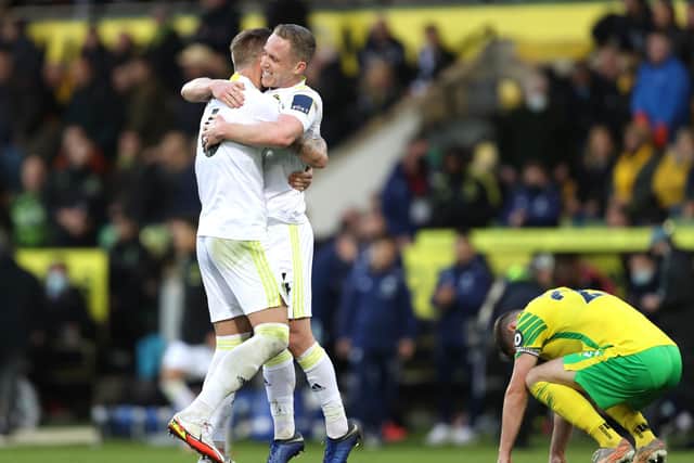 Adam Forshaw and Liam Cooper embrace. Pic: Julian Finney.