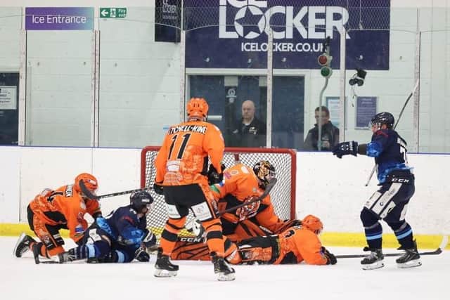 Telford Tigers could win the regular season NIHL National title this weekend - but their hopes of clinching a double took a hit last night when they lost 6-3 to Sheffield Steeldogs in the first leg of the National Cup Final. Picture courtesy of Peter Best/Steeldogs.