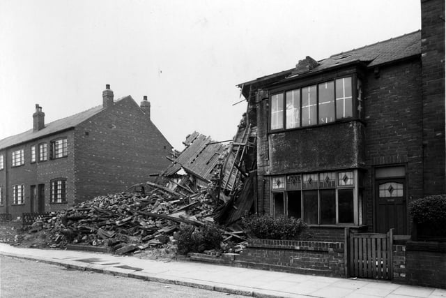 Air raid damage at houses on Model Road in Armley.