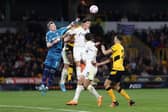 Leeds United goalkeeper Kristoffer Klaesson punches the ball clear. Pic: Naomi Baker.