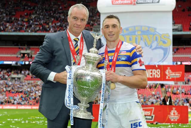 Leeds Rhinos head coach Brian McDermott and captain Kevin Sinfield celebrate winning the Challenge Cup in 2015 against Hull KR.