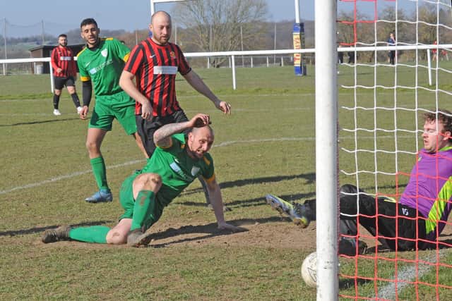 Farnley Sports' hat-trick hot shot Jordan Webb opens the scoring in Saturday's 8-2 Yorkshire Amateur Division 4 win at Leeds Modernians Reserves. Picture: Steve Riding.