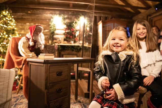 Pictured is Beau and Lola Russell as they wait to meet Father Christmas in a Grotto at Lapland UK in Whitmoor Forest, near Ascot in Berkshire.