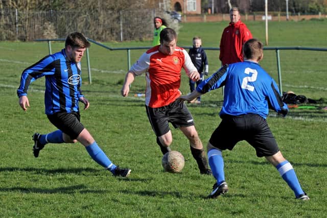 James Lee, of Old Centralians looks for a gap in the Altofts defence. Picture: Steve Riding.