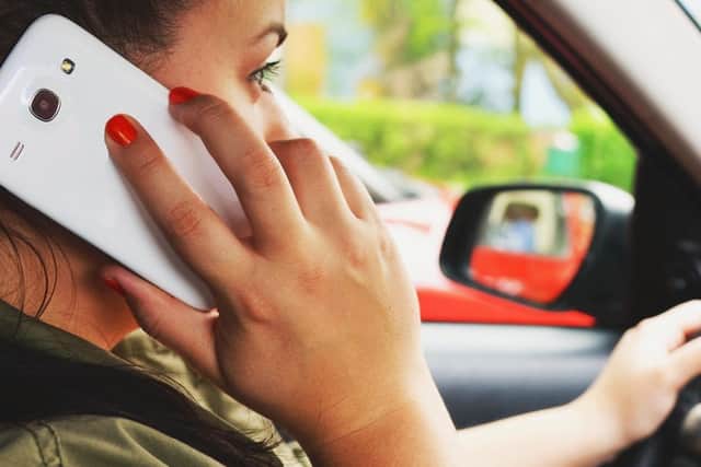 Motorists are being reminded the law around using your mobile phone while driving is changing.