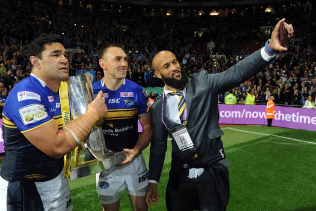 Jamie Jones-Buchanan, right, after Rhinos' 2015 Grand Final win with, centre, Kevin Sinfield and Kylie Leuluai. Picture by Steve Riding.