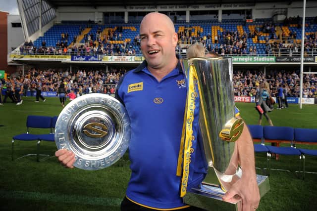 Jones-Buchanan is still in touch with Brian McClennan, pictured with both Super League trophies in 2009. Picture by Tony Johnson.