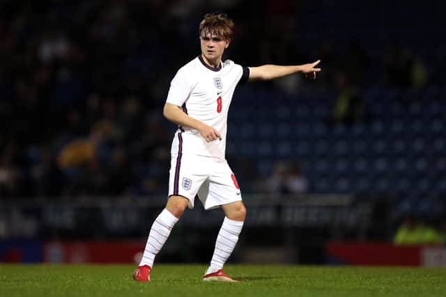 Leeds United midfielder Lewis Bate gives instructions during England Under 20s 1-1 draw with Italy.